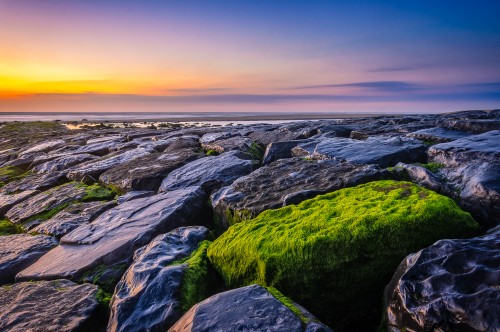 Green rock with sunset light